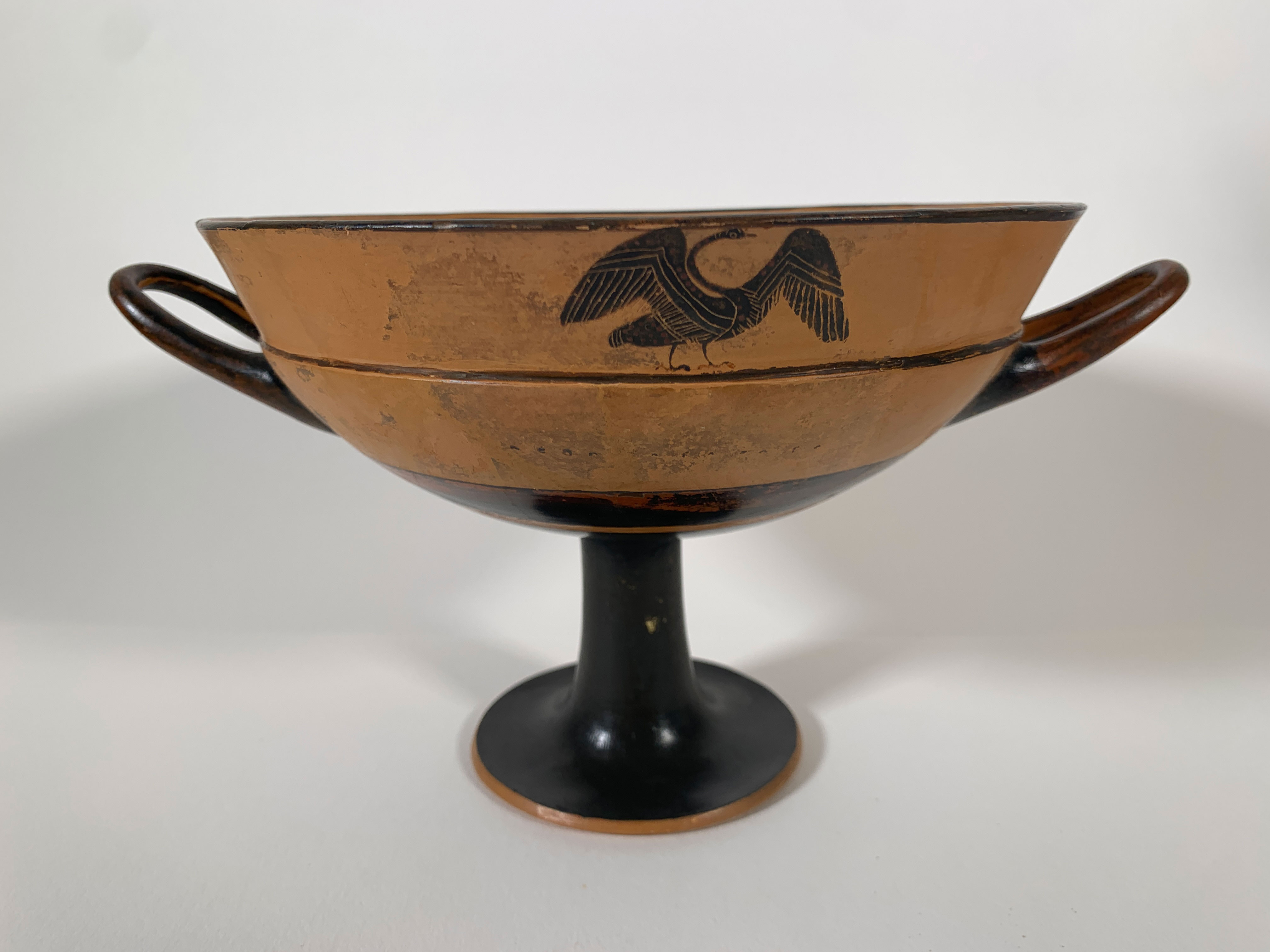 Attic Black-Figure Lip Cup attributed to Tleson depicting a swan with raised wings in black-figure technique